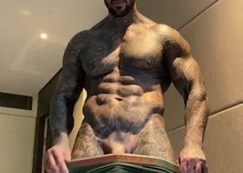 Hot Muslim guy covered in tattoos showing off his body and cock