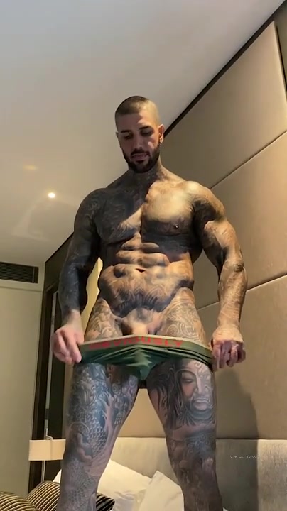 Hot Muslim guy covered in tattoos showing off his body and cock
